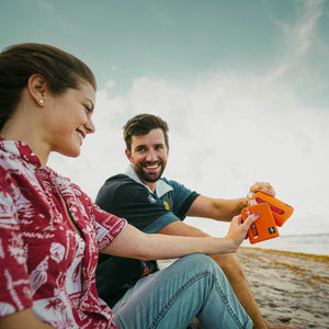 Mile High Orange Silicone Single 100mL and Double Shot 240mL Glass Flask Gift Set the beach