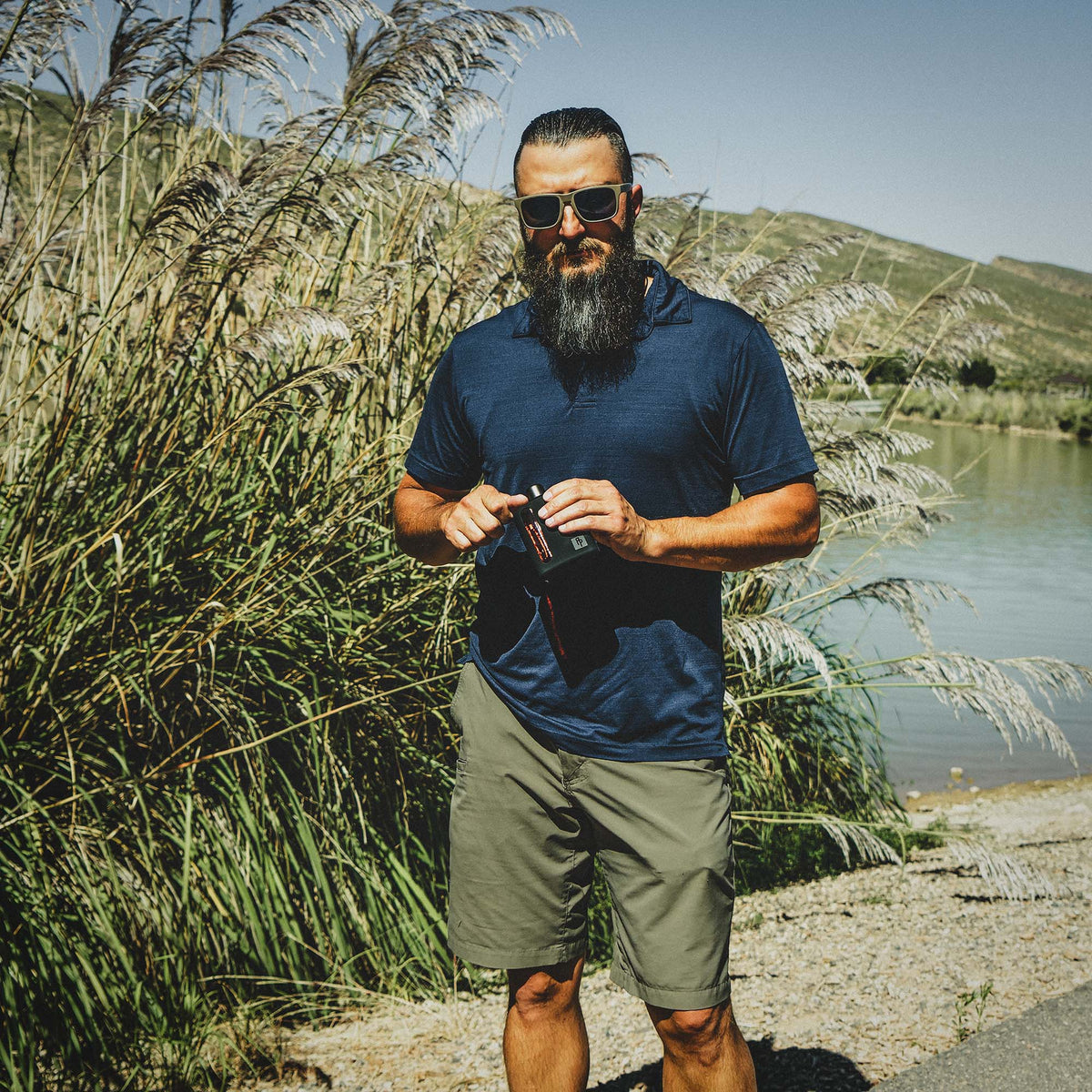 Black Silicone Glass Flask Single Shot 100mL outdoor lifestyle shot 